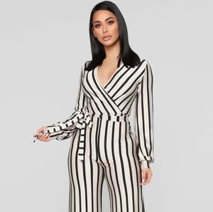 Fashion Nova Stripped Jumpsuit Size Large.